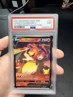 2021 POKEMON SWSH BLACK STAR PROMO CELEBRATIONS COLL LANCE'S CHARIZARD V PSA 9 - Image 1