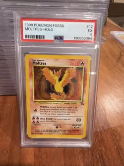 1999 Pokemon Fossil Moltres Holo #12 PSA 5 - Image 1