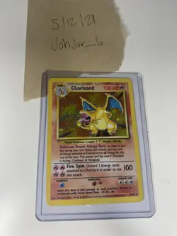 POKEMON CHARIZARD BASE SET #4/102 UNLIMITED RARE HOLO LIGHT TO MEDIUM PLAY - Image 1