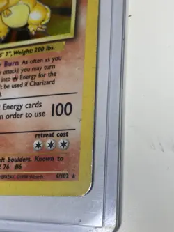 POKEMON CHARIZARD BASE SET #4/102 UNLIMITED RARE HOLO LIGHT TO MEDIUM PLAY - Image 2