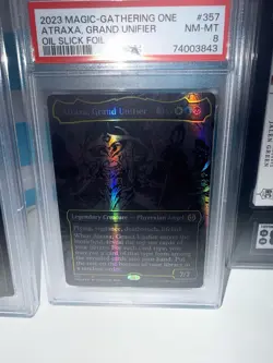 Atraxa, Grand Unifier (Oil Slick Raised Foil) Phyrexia: All Will Be One PSA 8 - Image 1