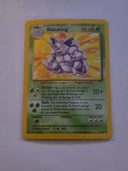 Nidoking 011/102 Base Set unlimited Holo Pokemon Card in near mint condition - Image 1