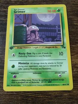 Pokemon Fossil 1st Edition Grimer 48/62 Non Holo NM-MINT - Image 1