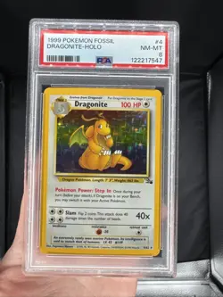 1999 Pokemon Fossil Dragonite 4/62 Holo Rare Unlimited PSA 8 - Image 1