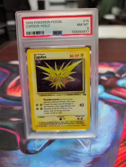 1999 Pokemon Fossil Zapdos Holo PSA Grade 8 - Image 1
