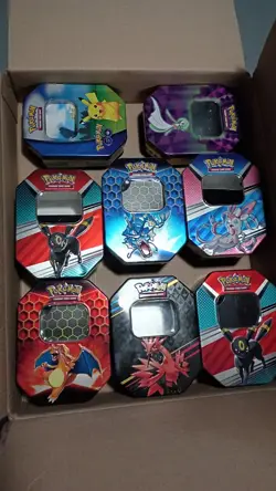 Lot Of 8 Empty Pokemon Tins Charizard Umbreon Gyarados Sylveon Pikachu Gardevoir - Image 1