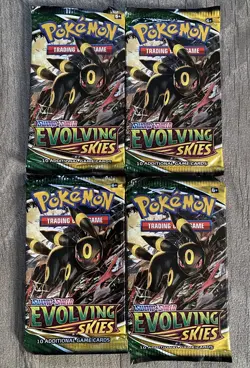 4 x Pokemon Evolving Skies Booster Packs Umbreon Pack Art Sealed With Mini Tins - Image 1
