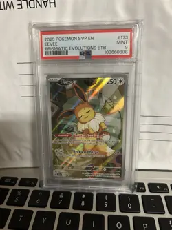 2025 POKEMON PRISMATIC EVOLUTIONS ETB PROMO #173 EEVEE PSA 9 - Image 1