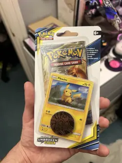 Pokemon Sun & Moon Unbroken Bonds Blister Pack Pikachu Holo Promo SM183 Coin - Image 1