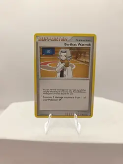 Berthas Warmth Rising Rivals NM, 90/111 Pokemon Card - Image 1