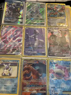 pokemon binder collection black yellow red and blue Pokemon with expensive cards - Image 1
