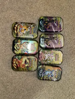 Pokemon Prismatic Evolutions Mini Tins x7 SEALED - Image 1