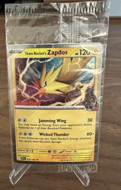 Pokemon TCG Team Rocket’s Zapdos 70/182 GameStop Stamped Promo Sealed - Image 1