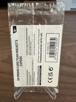 Pokemon TCG Team Rocket’s Zapdos 70/182 GameStop Stamped Promo Sealed - Image 2