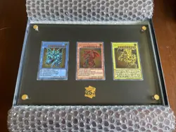 Yugioh TCG 25th Anniversary Stainless Steel Egyptian God Cards - Image 1