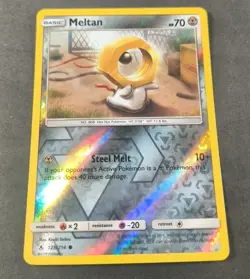 Pokemon Unbroken Bonds Meltan Reverse Holo Common Card 128/214 NM - Image 1