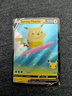 Pokemon TCG Surfing Pikachu V 008/025 Celebrations 25th Anniversary NM - Image 1