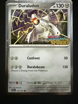 Duraludon #129/191 Surging Sparks Stamped Holo SV08 Pokemon Card NM - Image 1