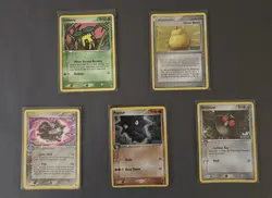Reverse Holo Pupitar, Forretress, and Other Unseen Forces Pokemon Card Lot - Image 1