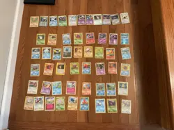 50 card + pokemon card lot contains holos , first edition cards , and older bulk - Image 1