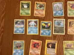 50 card + pokemon card lot contains holos , first edition cards , and older bulk - Image 2