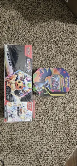Mega Charizard Tin (Mega Charizard X) and Pokemon Surprise Box - Image 1