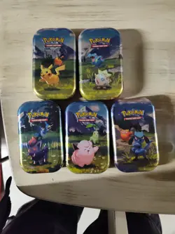 5 Pokemon Mega Evolutions Mini Tin( 2 Boosters,1 Sticker Sheet, Art Card) - Image 1