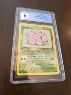 1999 Pokemon Jungle 1st Edition #52 - Exeggcute CGC 9 - Image 1