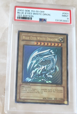 2002 SDK YU-GI-OH! Blue-Eyes White Dragon #001 1st Edition PSA 9 Ultra Rare - Image 1