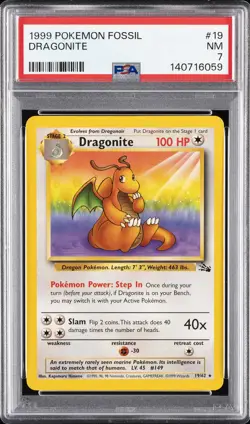 1999 POKEMON FOSSIL #19 DRAGONITE PSA 7 - Image 1