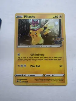 Pokemon: Pikachu SWSH234 Cosmic Holo Black Star Promo Card - Image 1