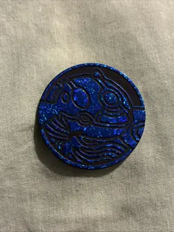 Pokemon TCG Primal Kyogre Blue Confetti Coin - Image 1