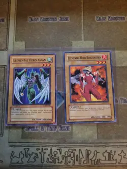 YUGIOH ELEMENTAL HERO AVIAN NM + ELEMENTAL HERO BURSTINATRIX TLM COMMON 1ST VLP - Image 1