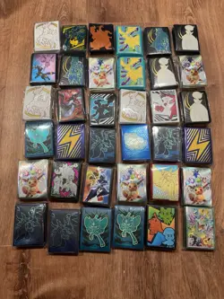 44 Pokemon TCG ETB and UPC Sealed Sleeves Lot - Image 1