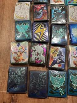 44 Pokemon TCG ETB and UPC Sealed Sleeves Lot - Image 3