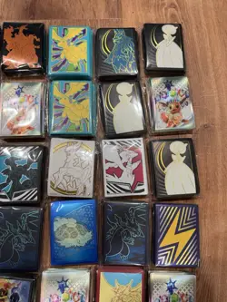 44 Pokemon TCG ETB and UPC Sealed Sleeves Lot - Image 5
