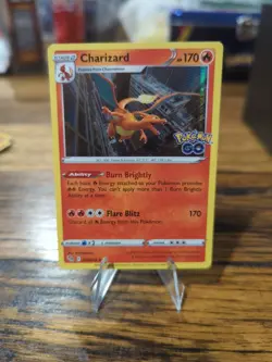 Charizard 10/78 Holo Rare NM Pokemon TCG - Pokemon Go English - Image 1