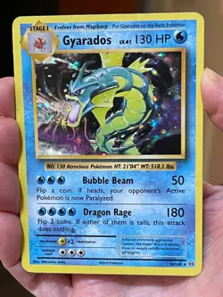 POKEMON GYARADOS 34/108 RARE HOLOFOIL EVOLUTIONS MP CARD - Image 1