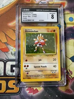 CGC 8 Hitmonchan 1999 Base Set 7/102 Holo Pokemon Card - Image 1