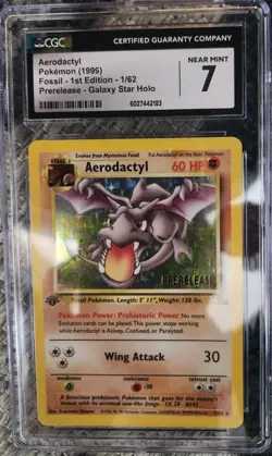 1999 POKEMON FOSSIL 1ST ED PRERELEASE COSMOS HOLO #1/62 AERODACTYL CGC 7 - Image 1