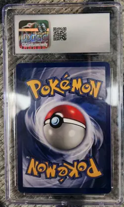1999 POKEMON FOSSIL 1ST ED PRERELEASE COSMOS HOLO #1/62 AERODACTYL CGC 7 - Image 2
