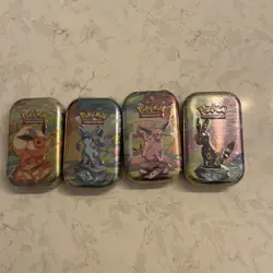 Pokemon Card 4x Scarlet & Violet Prismatic Evolutions Mini Tin SEALED - Image 1