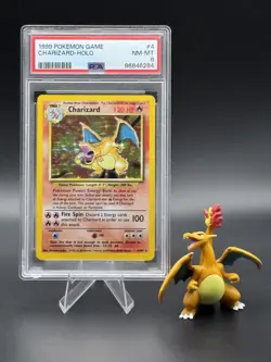 1999 POKEMON BASE SET UNLIMITED #4 CHARIZARD-HOLO PSA 8 - Image 1