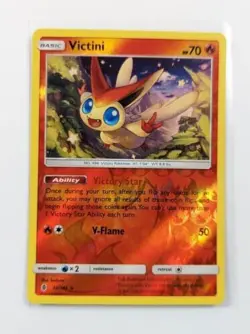Pokemon TCG Victini Sun & Moon: Guardians Rising 10/145 Reverse Holo Rare NM - Image 1