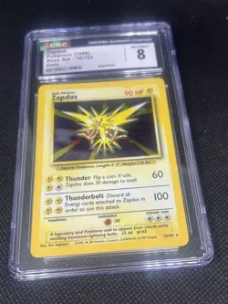 1999 POKEMON BASE SET - UNLIMITED - HOLO #16/102 ZAPDOS CGC 8 - Image 1