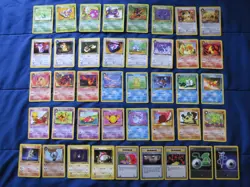 Near Complete Rocket's Team Common and Uncommon Pokemon Cards LP/NM - Image 1