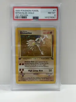 1999 POKEMON FOSSIL 1ST EDITION HITMONLEE HOLO 7 PSA 8 - Image 1