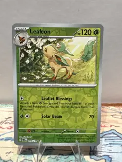Pokemon TCG SV-Prismatic Evolutions Leafeon #5/131 Rare Reverse Holo - Image 1