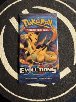 New Factory Sealed Pokemon Booster Pack XY Evolutions In Hand - Image 1