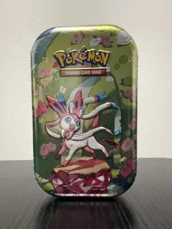 Pokemon TCG Scarlet and Violet Prismatic Evolutions Mini Tin Sylveon - Image 1